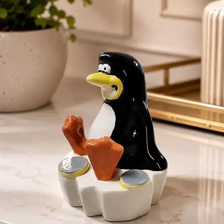 Playful Penguin Money Box